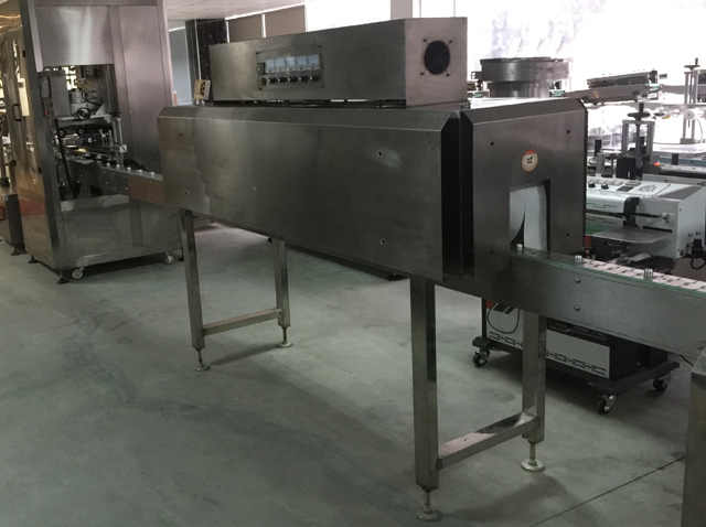 dây chuyền đóng nắp co lại.jpg