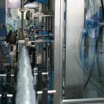 Máy chiết rót đóng nắp dán nhãn đóng thùng đóng gói tự động