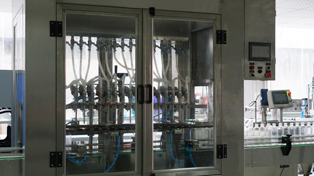 6 heads overflow filling machine máy chiết rót tràn.jpg