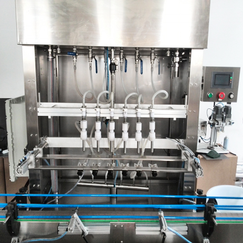 6 heads overflow filling machine máy chiết rót tràn.jpg