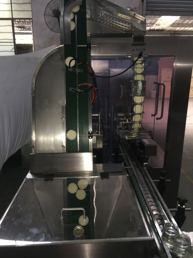 quy trình đóng nắp hút chân không lọ.JPG