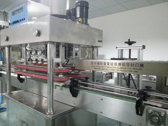 capping machine automatic high speed máy đóng nắp tốc độ cao.jpg