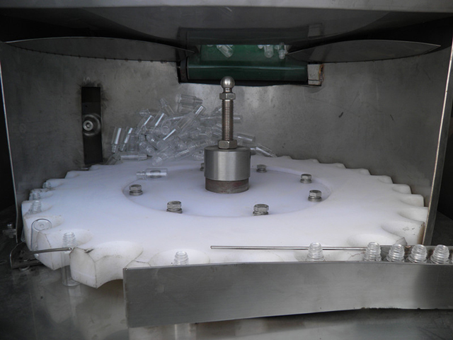 máy phân loại chai unscrambler.jpg