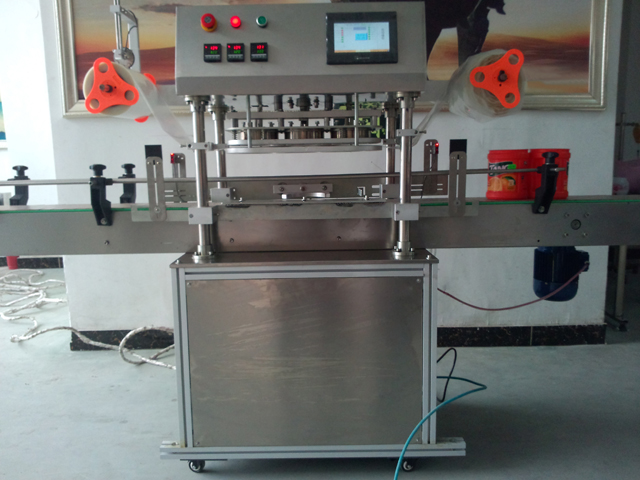 automatic three heads jars sealing equipment máy đóng lọ.jpg