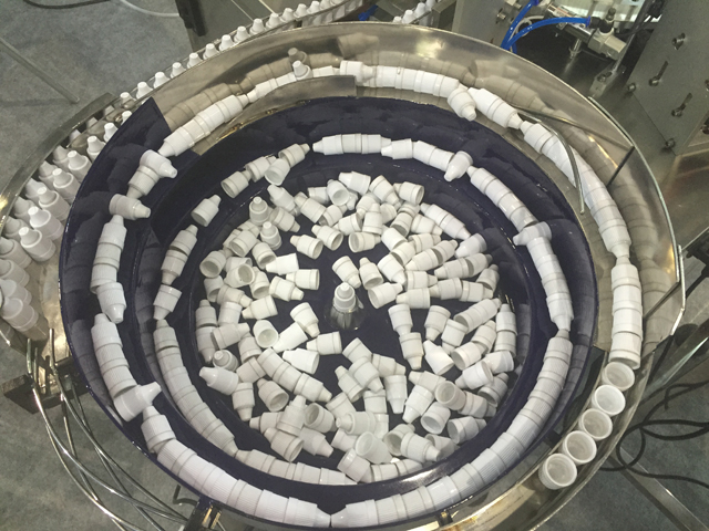 máy rung để nạp e liquid.jpg