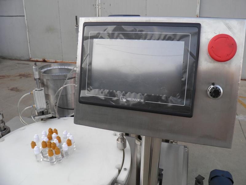 filling plugging capping labeling production line Nhãn đóng nắp chai E liquid PLC.jpg