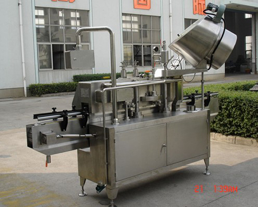 PLC-controlled system glass Jar twist off Steam Capper equipment vacuum capping machine for Glass Jars ảnh chụp phía sau nắp chân không vặn ra.jpg