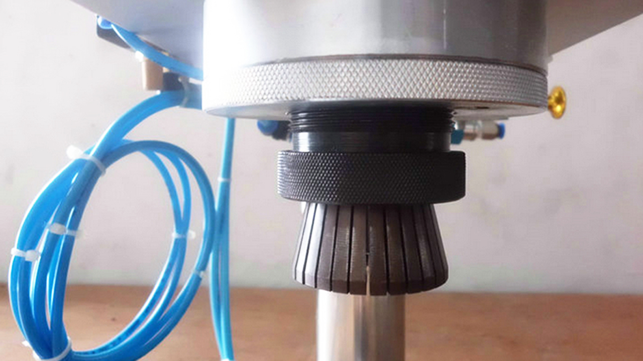 crimping head from pneumatic capping machines đầu uốn.jpg