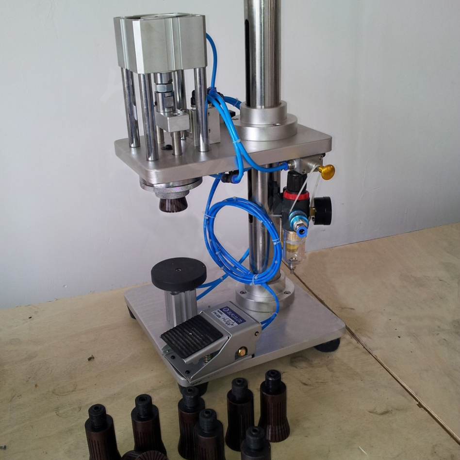 manual crimping machine for glass bottles thiết bị đóng nắp khí nén bán tự động pneumatic.jpg