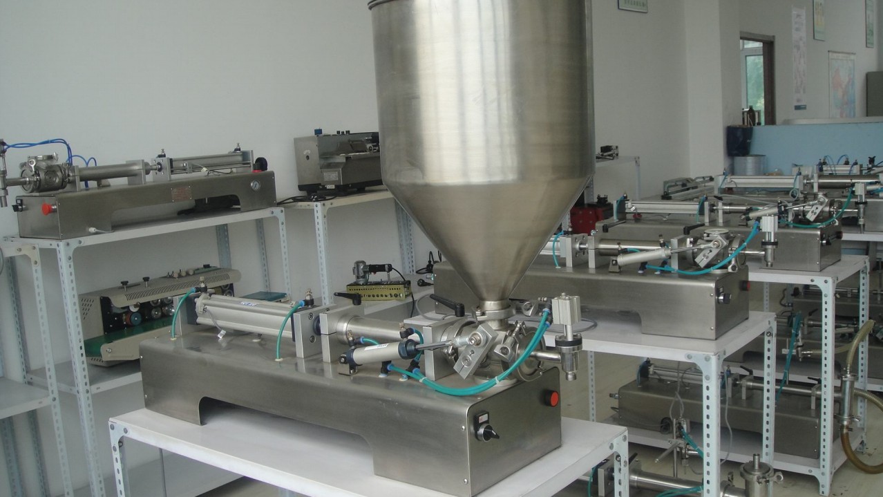 liquid cream lotion filling equipment pneumatic Máy chiết rót KEM & CHẤT LỎNG.jpg