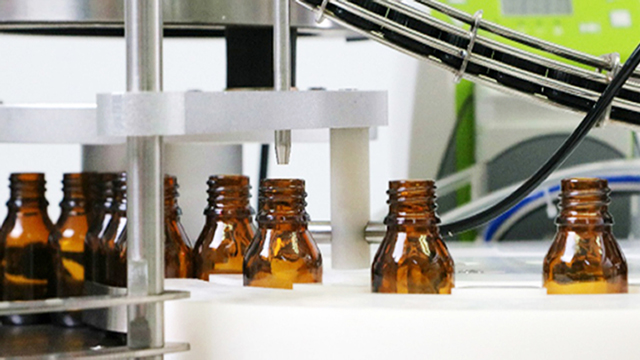 máy chiết rót chai loại để bàn.jpg