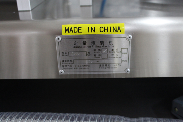 máy chiết rót vòi phun đôi.jpg